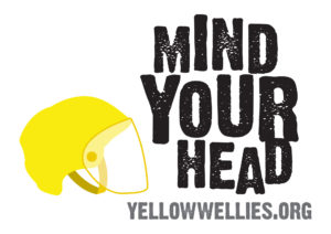 Picture of yellow hard hat next to text saying: "Mind Your Head"