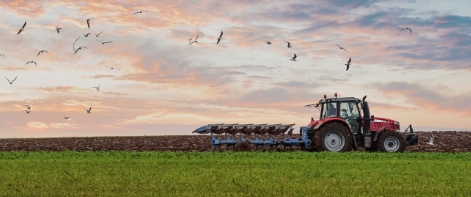 tractor ploughing a field